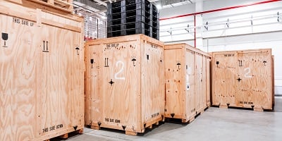 2-20-21-bigstock-Wooden-Boxes-In-The-Warehouse--382119800