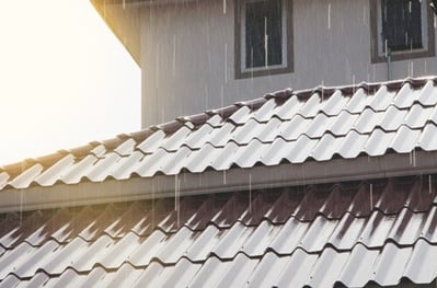 4-27-24-metal_roof_rain_shutterstock_633480746