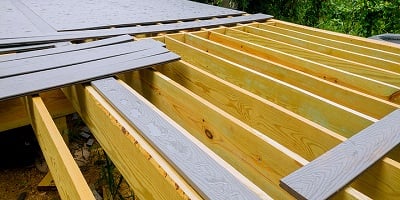 6-19-21-bigstock-A-New-Wooden-Timber-Deck-Bein-342027061