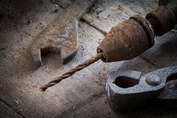 rsz_bigstock-old-rusty-tools-in-the-worksho-99255113